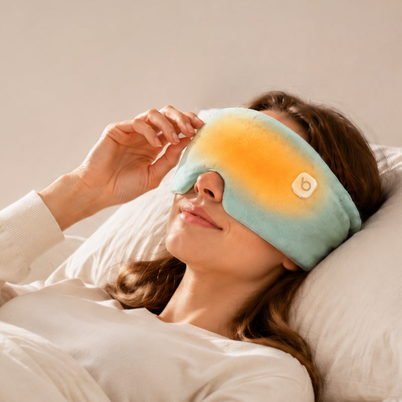 Bwarm heated weighted eye sleep mask made of soft cotton with gentle heating and calming pressure for restful sleep.
